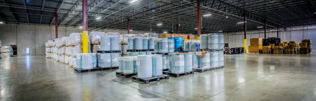 Specialized container stuffing services at Distributors Terminal's agricultural warehousing facility in Indiana preparing goods for international shipping